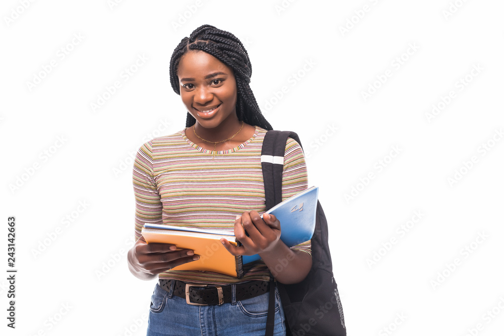 African American student girl holding books isolated on white background. - obrazy, fototapety, plakaty 