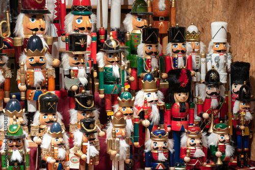 Display of nutcracker soldiers and decorations on sale at Christmas market stall