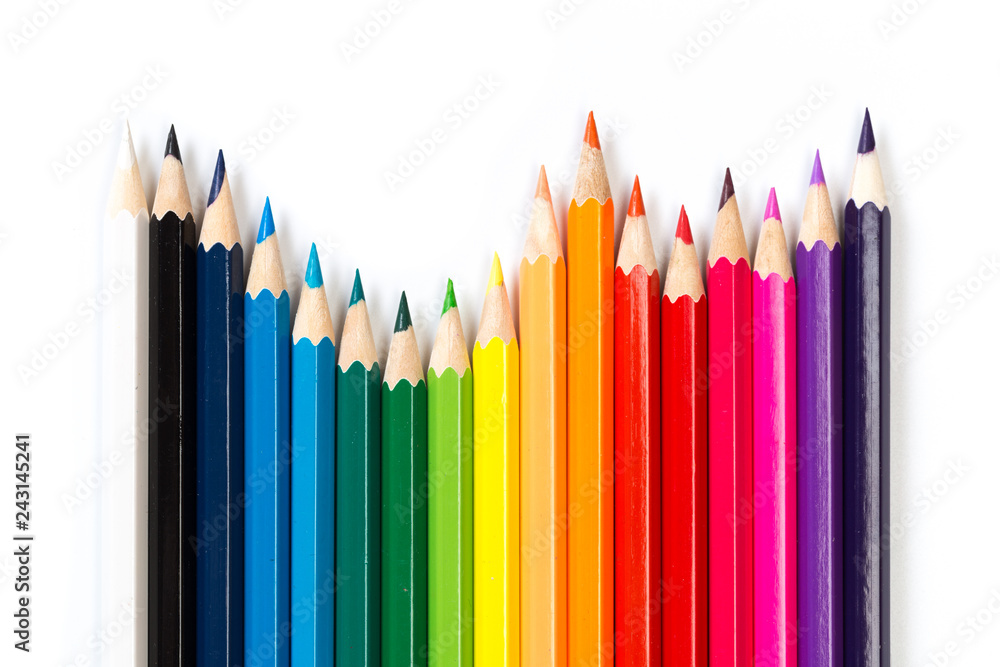 Colour pencils on white background, top view. Colour pencils on white background, top view.