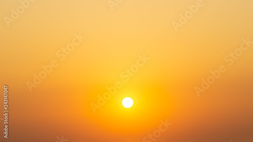 sun on clear orange sky nature background