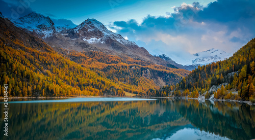 Lago di Gioveretto (Zufrittsee) during autumn, Martello Valley, Venosta Valley, province of Bolzano, South Tyrol, northern Italy, Europe.Beauty of nature concept background.