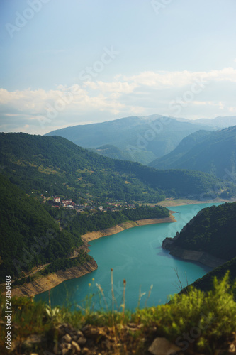 Stunning views from the top of the mountains  the valley and the man-made reservoir in Montenegro.