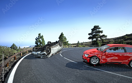Two cars Crashed on the road in the country side location.