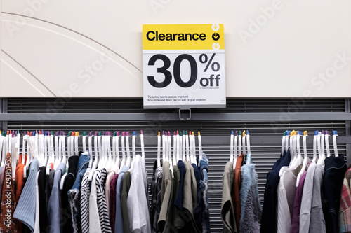 Signs on sale with 30 percentage off in department stores