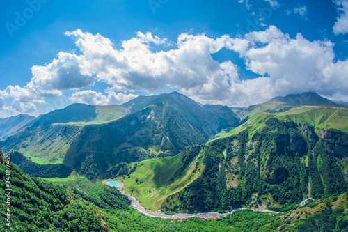 Beautiful summer mountain landscape. High green mountains on sunny day. Georgia Gudauri. © ARTPROXIMO