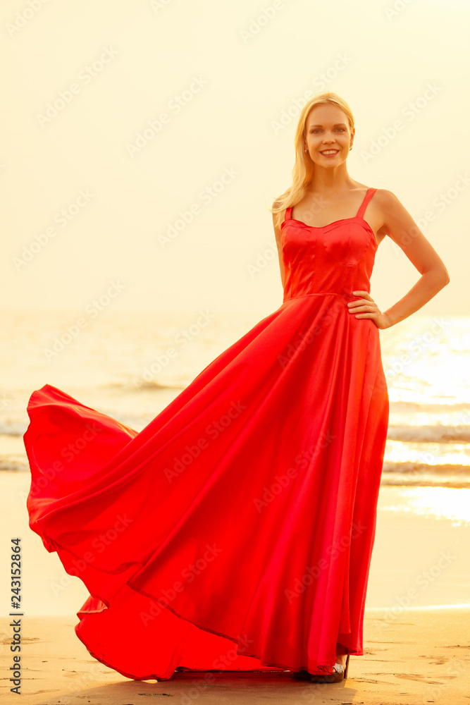 Beautiful blonde sensual glamour passion desire sexuality woman in flying red butterfly silk dress sea and tropical island sunset background.tango romance valentine's day Beautiful blonde sensual glamour passion desire sexuality woman in flying red butterfly silk dress sea and tropical island sunset background.tango romance valentine's day