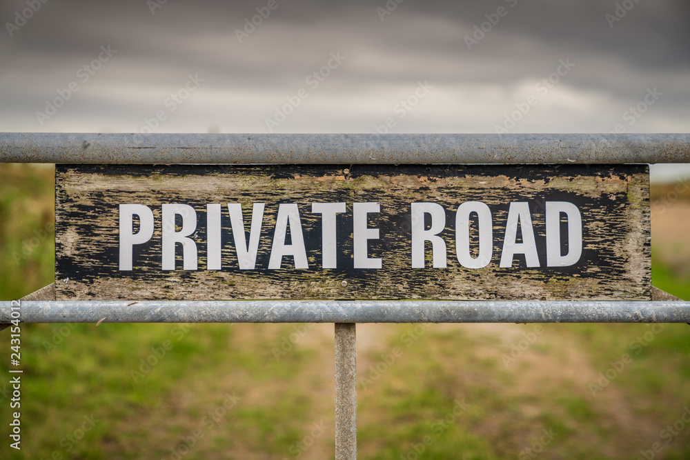 Sign: Private Road, seen in Low Hauxley in Northumberland, England, UK