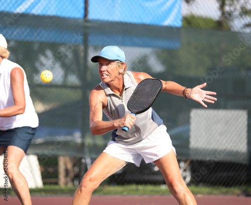 A woman competes in a pickleball match © Ron Alvey