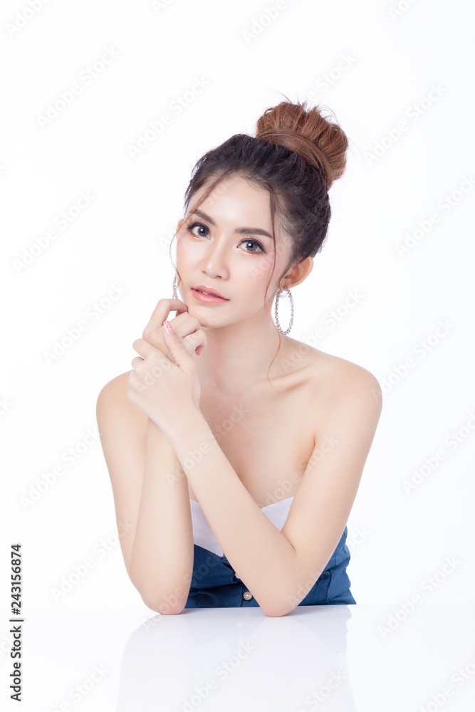 Portrait of attractive asian woman sitting smiling on white background. Healthy skin woman natural makeup beauty face concept. Using as your Product. Portrait of attractive asian woman sitting smiling on white background. Healthy skin woman natural makeup beauty face concept. Using as your Product.