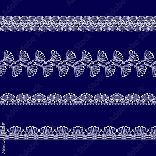 set of white lace ribbons