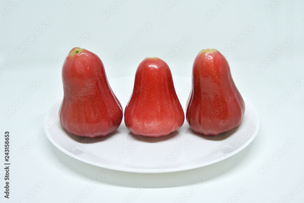 Rose apple fruit or the scientific name is Syzygium samarangense. Watery delicious fruit fresh harvested from the farm isolated on white background. Rose apple fruit or the scientific name is Syzygium samarangense. Watery delicious fruit fresh harvested from the farm isolated on white background.