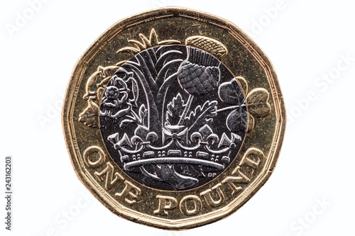 New one pound coin of England UK introduced in 2017 which show emblems of each of the nations cut out and isolated on a white background photo
