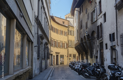 Walk through the old and narrow streets of Florence near the Cathedral of Santa Maria del Fiore. Italy.