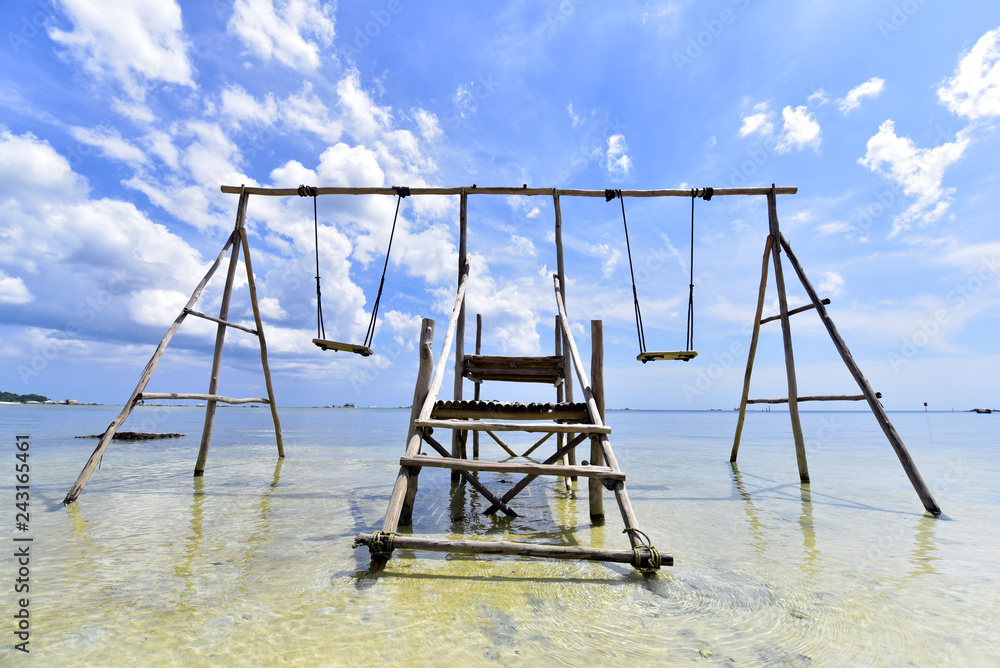 Swing located in Pantai Tanjung Kelayang Beach near the island of Belitung, Indonesia Swing located in Pantai Tanjung Kelayang Beach near the island of Belitung, Indonesia