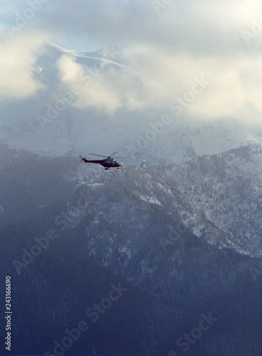 rescue helicopter in action, Tatry mountain, Poland - November, 2004