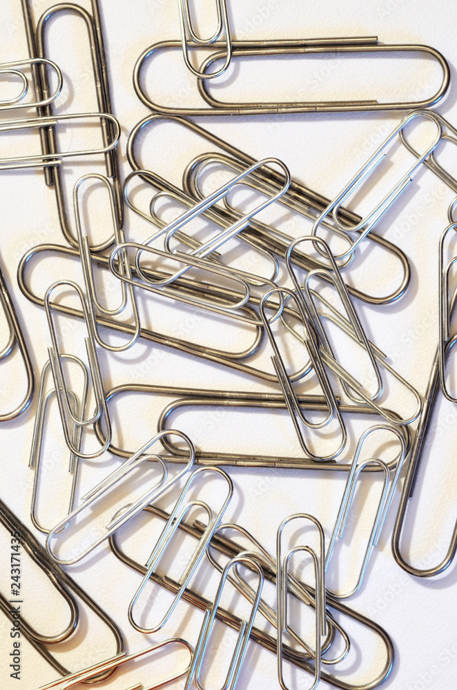 The paper clip is used to fasten paper sheets. The paper clip is used to fasten paper sheets.