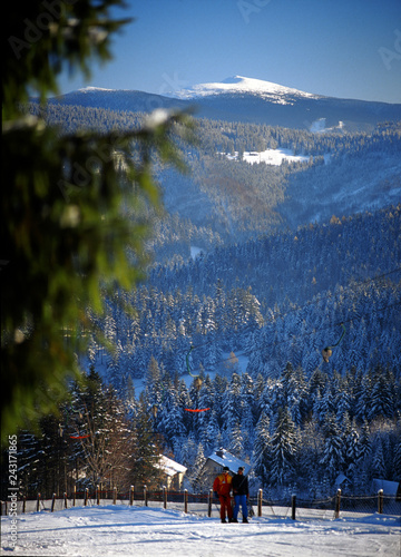 Ski lift in Korbielow and view from Pilsko to Babia Mountain (Babia Gora), Poland. photo