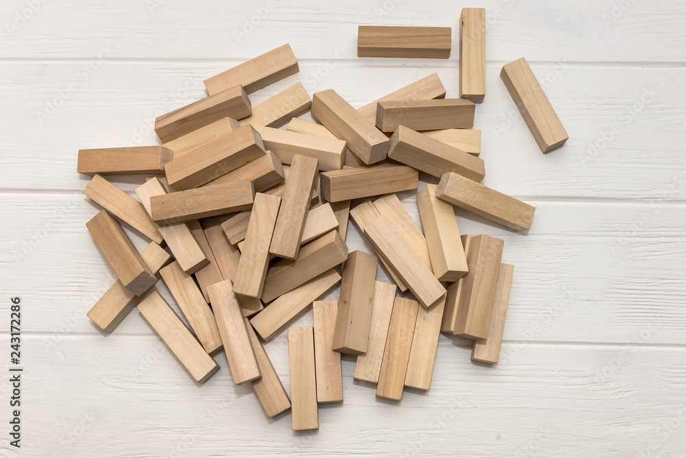 Wooden blocks for tower building on the desk Wooden blocks for tower building on the desk