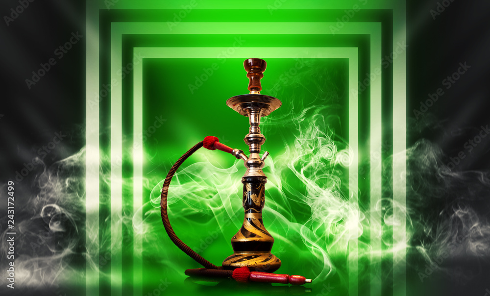 Hookah smoking on a futuristic background with neon rays, smoke, spotlight. Background trend color ufo green Hookah smoking on a futuristic background with neon rays, smoke, spotlight. Background trend color ufo green