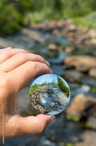 Fototapeta Naklejka Na Ścianę i Meble -  Enviromental nature concept with glass ball