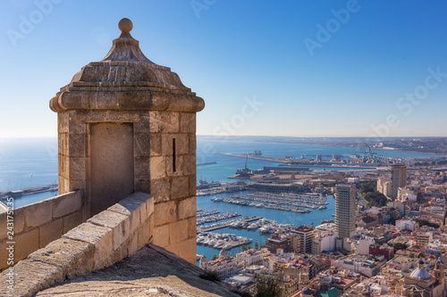 Sentry box at Santa Barbara Castle in Alicante with the view on the port and the sea at the background - Alicante, Community of Valencia, Spain, Europe photo