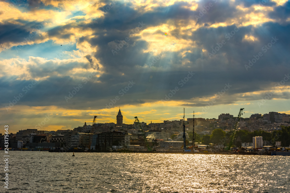 The sunset above the Galata Tower in Karakoy part of the city of Istanbul