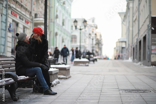 Young couple walking through the winter