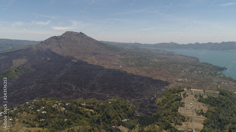Obraz premium Aerial view landscape after volcanic eruption volcano Batur mountain landscape with volcano sky and clouds Bali, Indonesia. Travel concept.