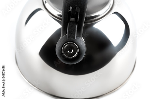 A new metal kettle with a whistle on a white background. Teapot. Teakettle.