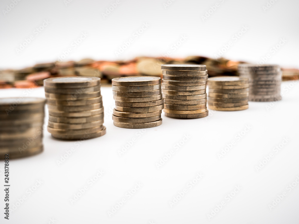 Image of pile of Euro coins with cent coins in the background close up Image of pile of Euro coins with cent coins in the background close up