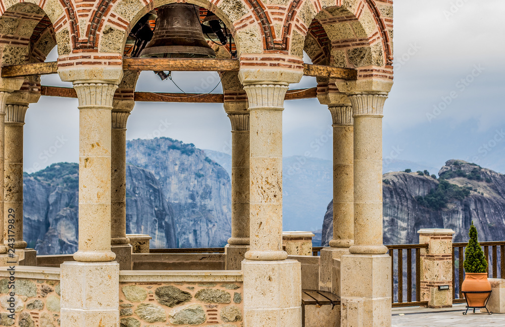 European medieval building landmark  gazebo and observation deck object in highland monastery yard with picturesque mountain background landscape view