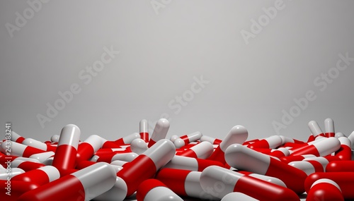 pill capsule in white and red on white ground
