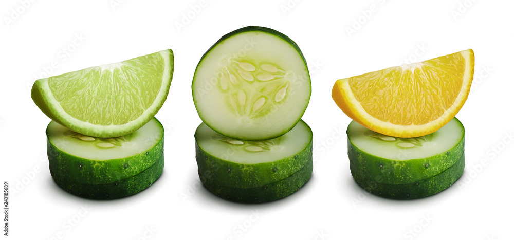 Slices of cucumber with lemon and lime isolated on white background. Vegetable set. Refreshing combination. Slices of cucumber with lemon and lime isolated on white background. Vegetable set. Refreshing combination.