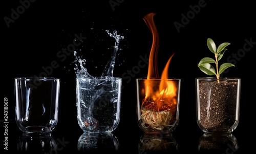4 elements described in drinking glasses on black background, air, water, fire, earth