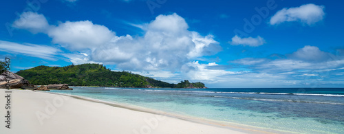Tropical beach with sea and palm . Beach and sea photo. Romantic beach aerial view. Seychelles
