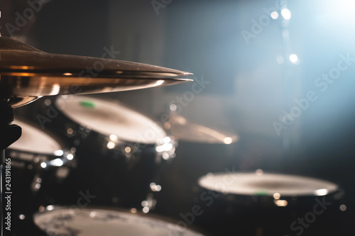 Photography Close-up Drum set in a dark room against the backdrop of the spotlight