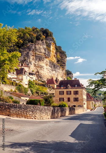 Medieval village of Aquitaine with its stone houses in the south of France on a cloudy day.