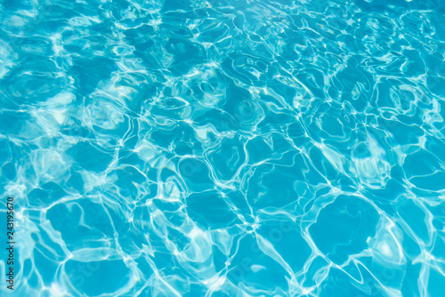 Blue ripped water in swimming pool. water surface background.