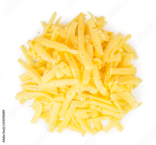 Pile of grated cheese on a white. The form of the top.