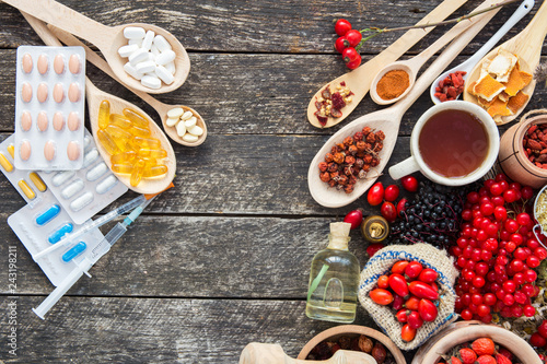Medicinal tablets and pills and herbs composition: Dog rose, bunch branch Rosehips, types Rosa canina hips, essential oil. bunch, dried flowers of linden and chamomile elderberries and goji berries. 