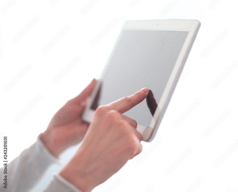close up.woman's hand pressing on screen digital tablet .photo w close up.woman's hand pressing on screen digital tablet .photo w