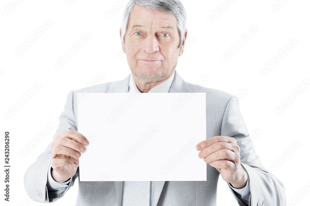 Nice businessman at the age of't holding a big white poster. Isolated on a white background. Nice businessman at the age of't holding a big white poster. Isolated on a white background.