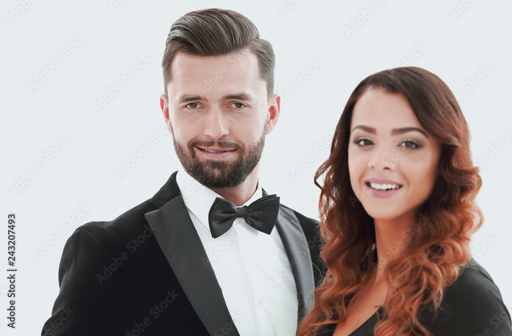Portrait of a handsome man looking at the camera with a woman Portrait of a handsome man looking at the camera with a woman