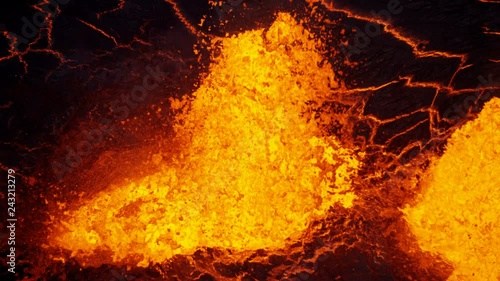Aerial explosive molten lava spewing from erupting fissure photo