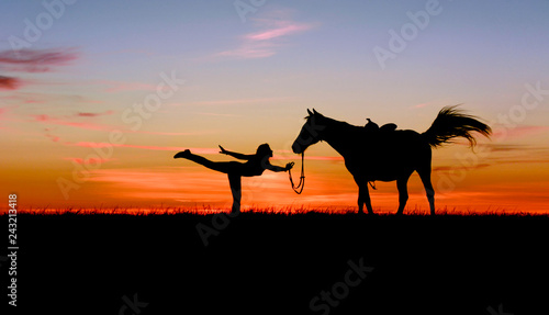 Romantic silhouette of slim toned girl and horse on bright blue sunset. Beautiful woman practicing yoga pose outdoor. Fitness, wellness and horsemanship concept on multi-colored sky background. © Max