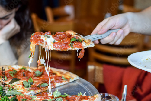 Slice of pepperoni pizza