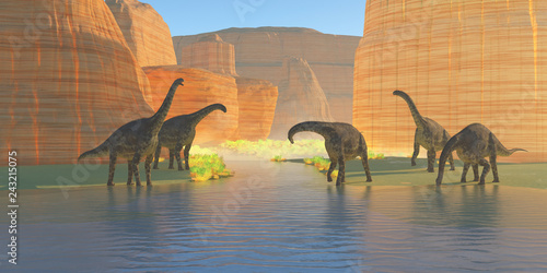 Cetiosaurus Canyon River -A herd of Cetiosaurus dinosaurs drink from a canyon river during the Jurassic Period of Morocco, Africa.  © Catmando