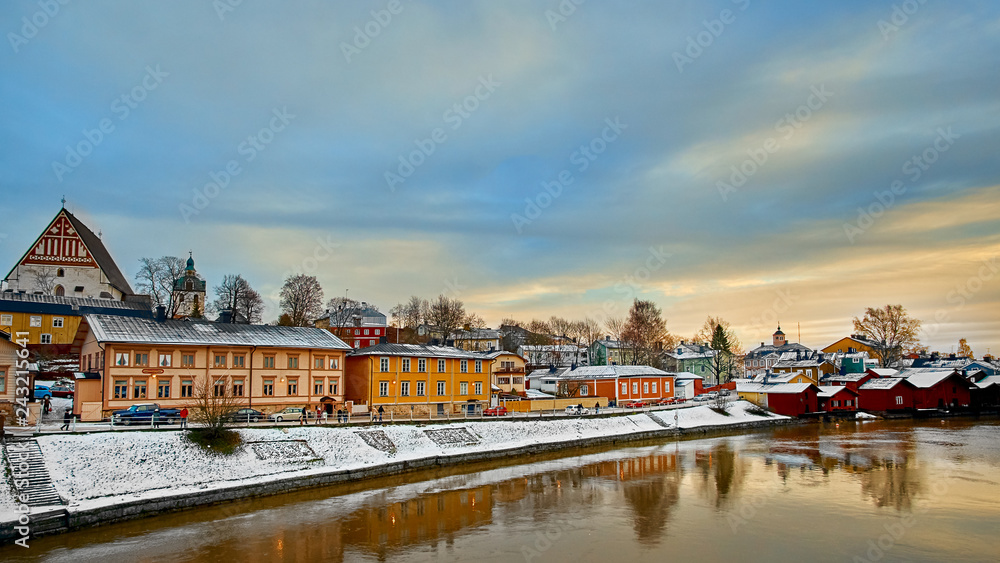 Obraz premium Old historic Porvoo, Finland with wooden houses and medieval stone and brick Porvoo Cathedral at blue hour sunrise