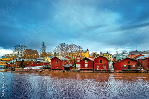 Old historic Porvoo, Finland with wooden houses and medieval stone and brick Porvoo Cathedral at blue hour sunrise