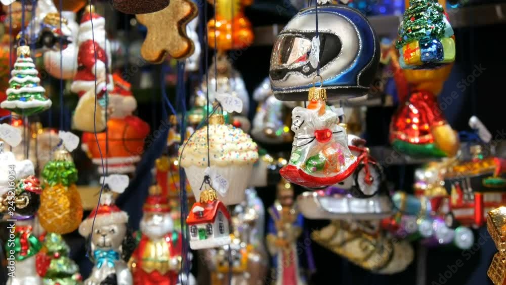 Various beautiful Christmas balls and toys to decorate the Christmas fir on the market counter. Inscription in german Various beautiful Christmas balls and toys to decorate the Christmas fir on the market counter. Inscription in german